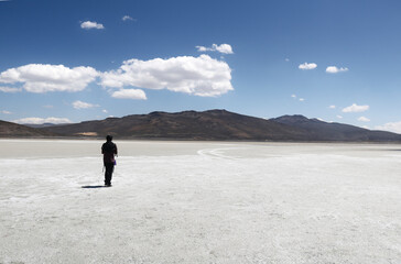 Salt flat. Lonely person in Peru Salt Flat. Aguada Blanca. 