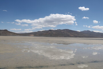 Fototapeta na wymiar Salinas Peru Aguada Blanca. Salt Flats Peru. Mountain reflection in salt flat