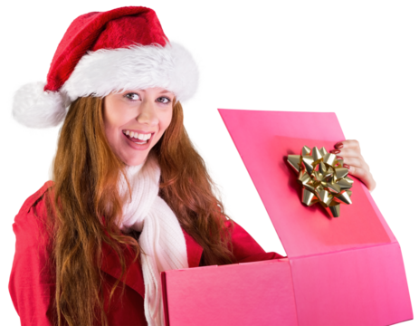 Festive redhead opening a gift