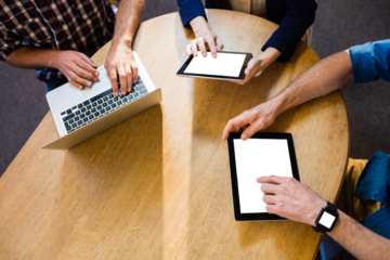 Colleagues using technology