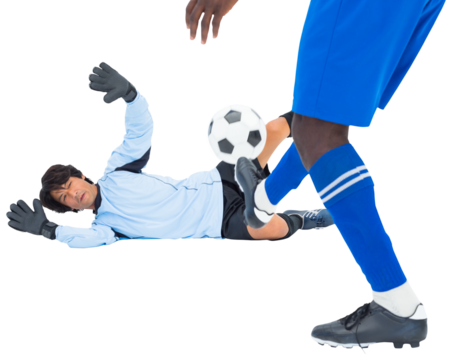 Striker kicking the ball towards goalkeeper