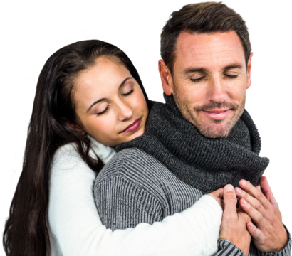 Smiling couple hugging eyes closed 