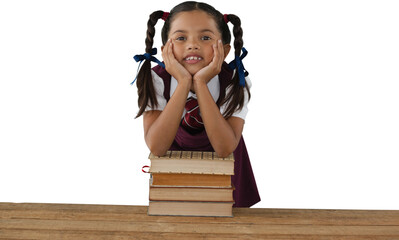 Schoolgirl leaning on stack of books