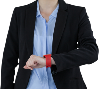 Mid-section of businesswoman wearing smartwatch