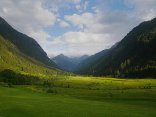 Fototapeta na wymiar Scenic mountain landscape with beautiful valley and mountain peaks