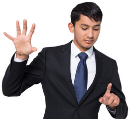 Unsmiling businessman holding and pointing