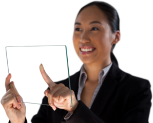 Smiling businesswoman looking away while touching glass interface