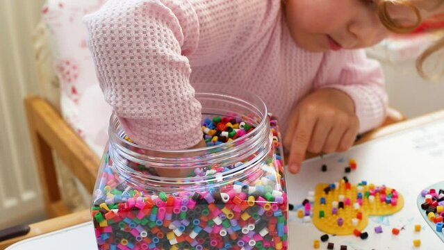 Children's game with beads at home