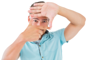 Handsome young man framing with hands