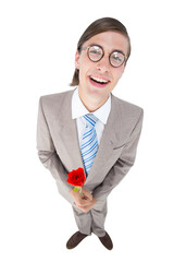 Fototapeta premium Geeky lovesick hipster holding rose 