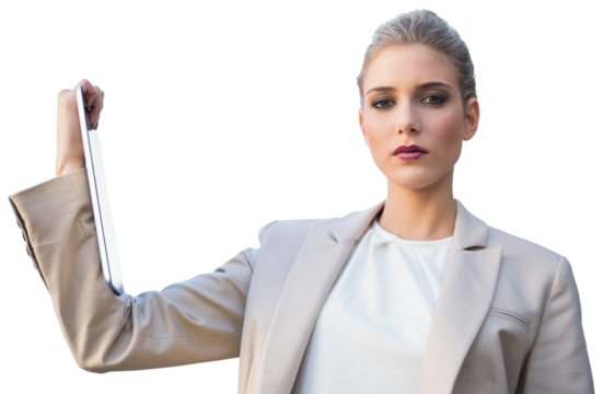 Serious classy businesswoman holding tablet 