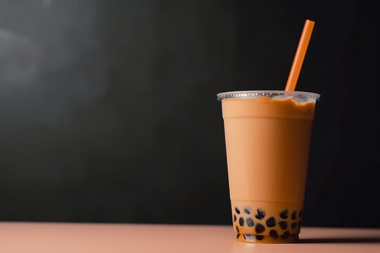 bubble tea with tapioka pearls on a dark background with copy space. AI generated content