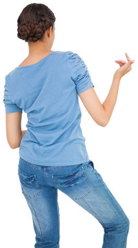 Pretty brunette playing air guitar