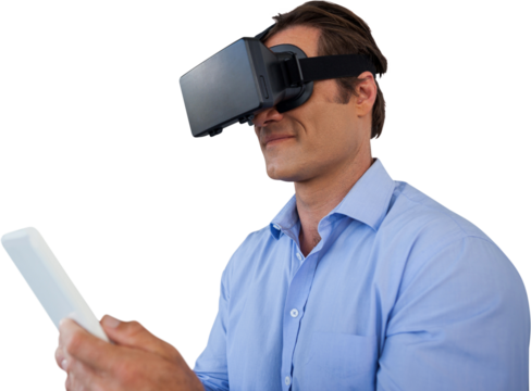 Businessman using vr glasses while holding tablet computer - Powered by Adobe