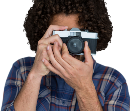 Male photographer taking picture with camera