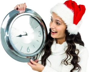 Happy woman with christmas hat holding clock
