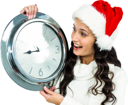 Happy woman with christmas hat holding clock