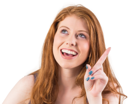 Pretty redhead pointing and looking up