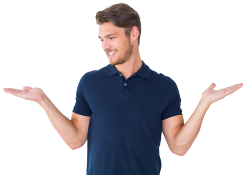 Handsome young man holding his hands out