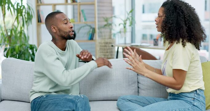 Couple, cheating and argument in home, fight or disagreement on sofa. Interracial, divorce affair and angry black man and woman shouting with conflict, frustrated or marriage problem for infidelity.