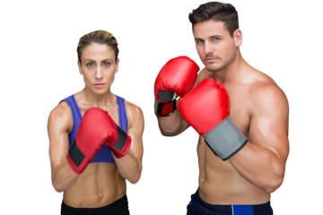 Portrait of man and woman wearing boxing gloves