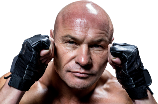 Close-up of confident man with fighting stance - Powered by Adobe