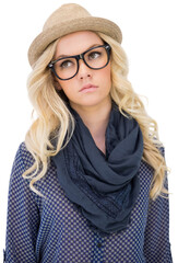 Serious trendy blonde with classy glasses posing