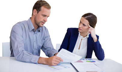 Fototapeta premium Business people analyzing data while sitting qagainst white background