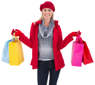 Blonde in winter clothes holding shopping bags