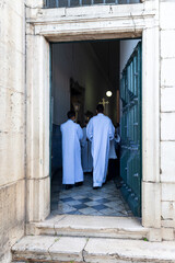 Priests and seminarians participate in the mass in honor of Nossa Senhora da Conceicao da Praia