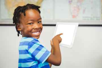 Boy pointing over digital tablet