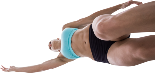 Low angle female athlete jumping