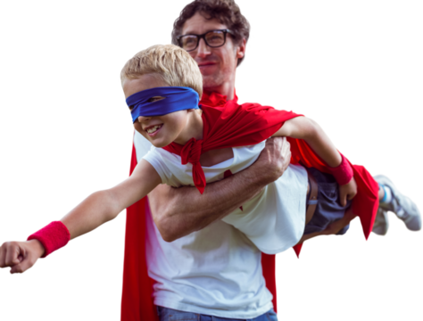 Father carrying son while standing