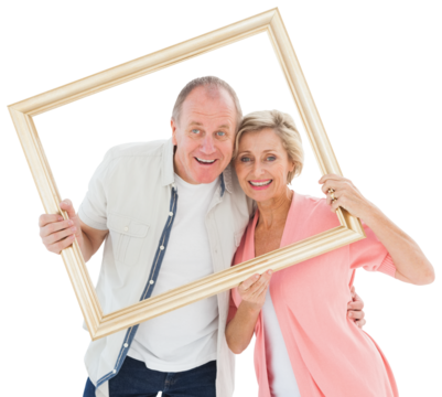 Older couple smiling at camera through picture frame