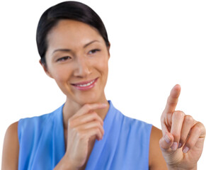 Smiling businesswoman with hand on chin touching interface