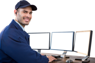 Smiling security officer using computer
