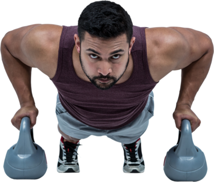 Muscular man doing push ups with kettlebells - Powered by Adobe