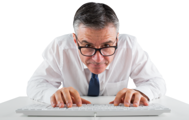 Mature businessman typing on keyboard