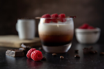 White Russian Cocktail with Raspberry Garnish