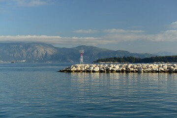 Naklejka premium Old Port, Corfu island, Greece- Morning view from the island to mainland Greece.