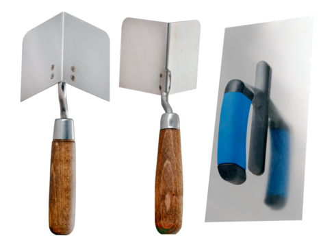 Spatula for applying plaster in household renovations. Minor renovation work. Isolated background.