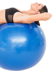 Fototapeta na wymiar Side view of a fit woman stretching on fitness ball