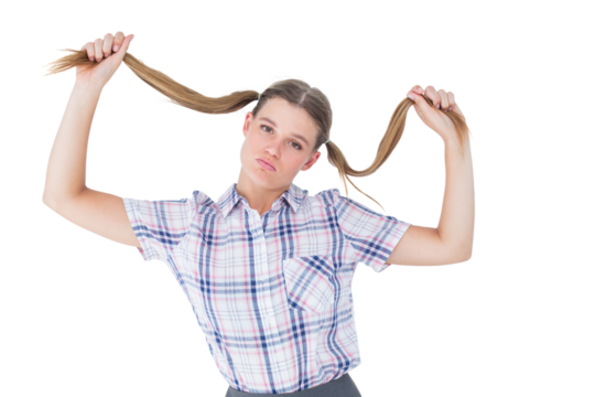 Geeky hipster holding her pigtails