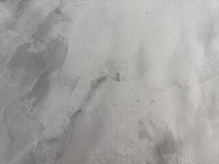 The cement wall background abstract gray concrete texture for interior design, close up, detail. Pattern in dark and light shades smooth dirty stucco retro design. Modern creativity decoration concept