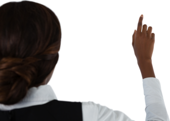 Rear view of businesswoman touching invisible screen