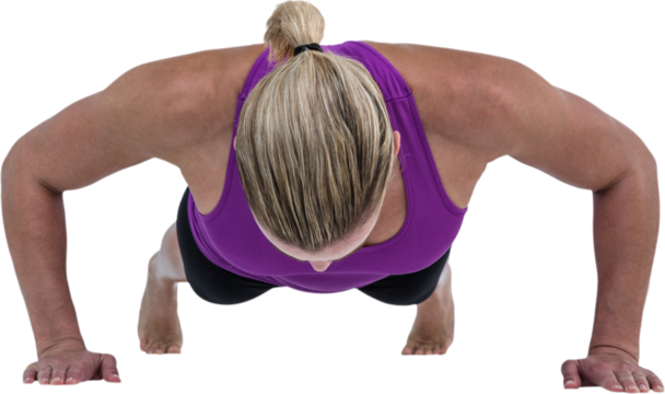 Muscular woman doing push ups 