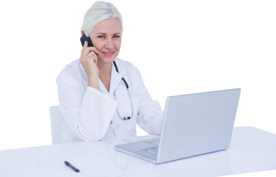 Portrait of smiling female doctor talking on mobile phone