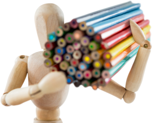 Wooden figurine carrying bunch of colorful pencils