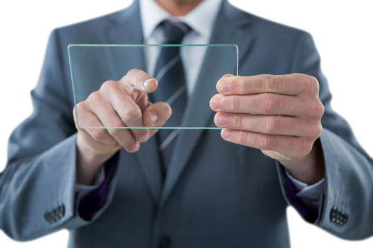 Businessman touching glass sheet