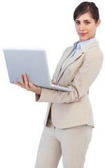 Confident young businesswoman with laptop
